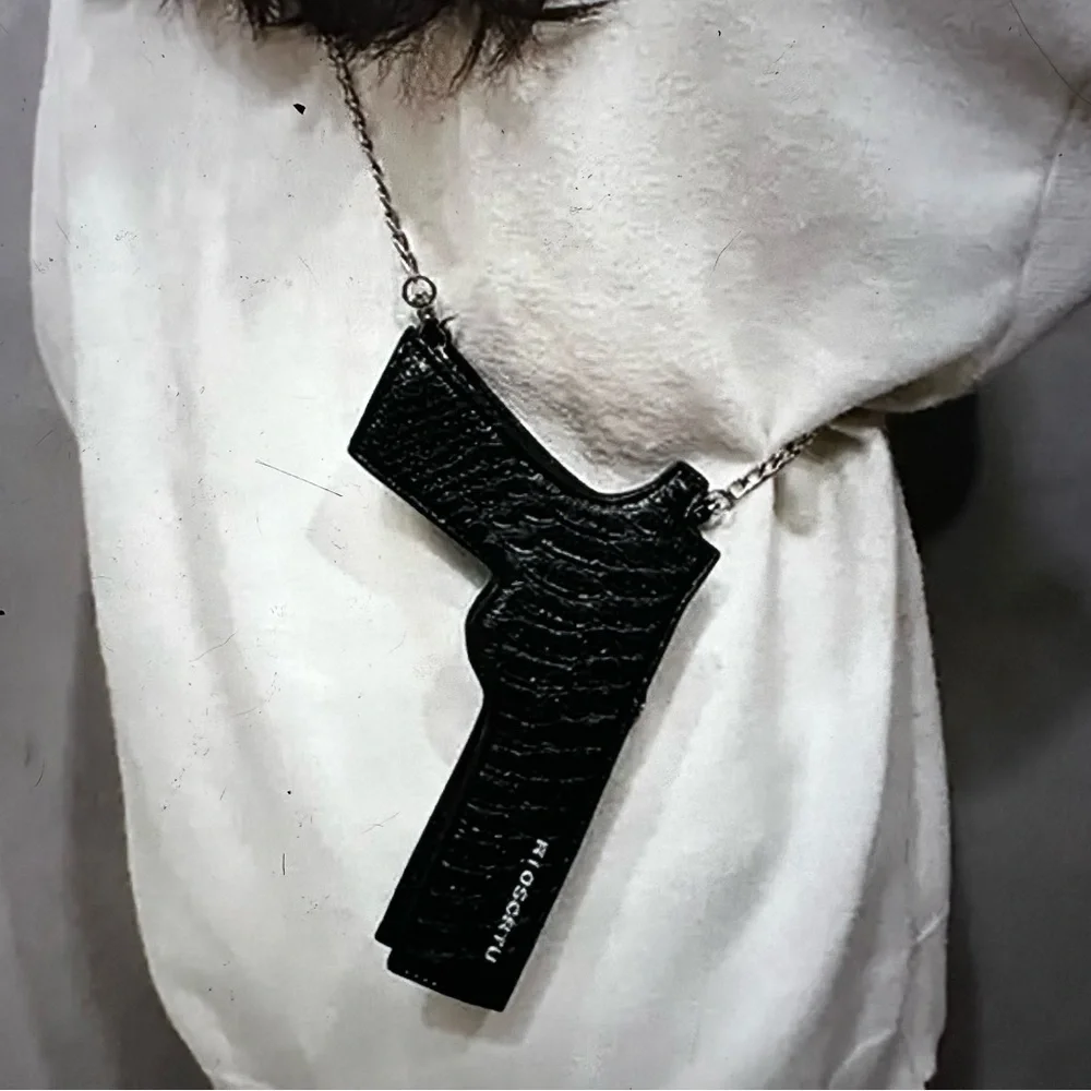 Black pistol shaped hip holster mini little purse handbag.